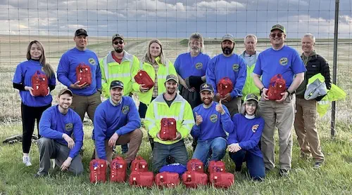 Fifteen search and rescue responders in uniform